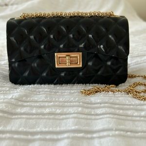 Black and gold shoulder purse